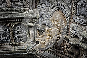 Details of the superbly carved sunken water tank known as the Tusha Hiti inside Â the beautiful courtyard of Sundari Chowk